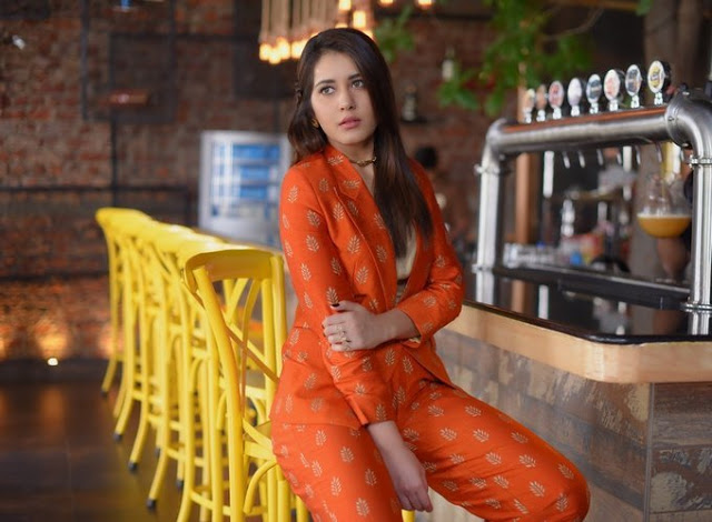 Raashi Khanna latest Photo Shoot In Long Hair Orange Dress 11